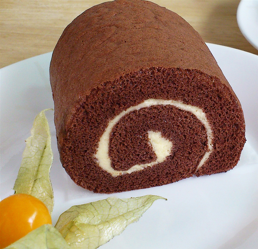 1 piece of chocolate swiss roll, decorated with golden berry