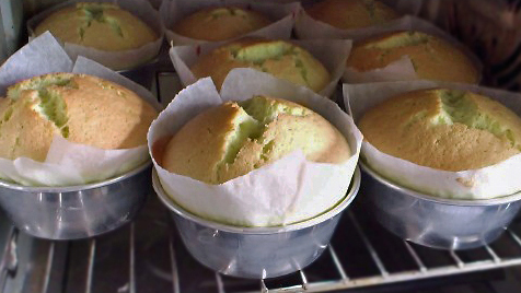 pandan chiffon cupcakes, with cracked tops, baking in oven